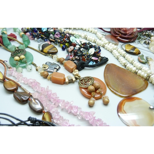 7134 - A collection of costume jewellery including semi precious stones