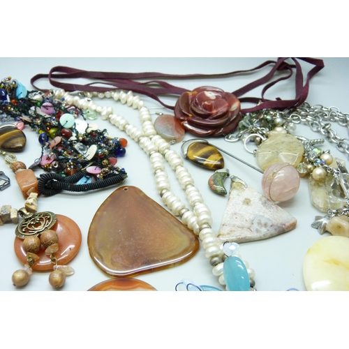 7134 - A collection of costume jewellery including semi precious stones