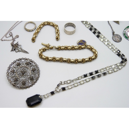 7137 - Two silver rings, a silver brooch, two silver pendants on chains, 29g total, together with other vin... 