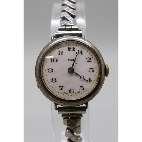 7167 - Four lady's silver cased wristwatches