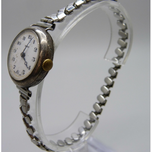 7167 - Four lady's silver cased wristwatches