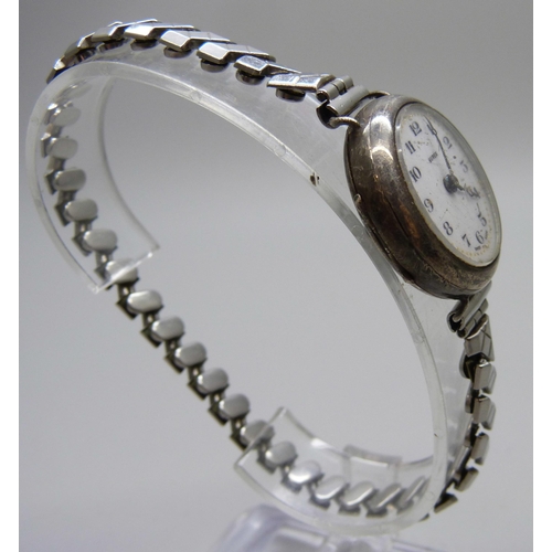 7167 - Four lady's silver cased wristwatches