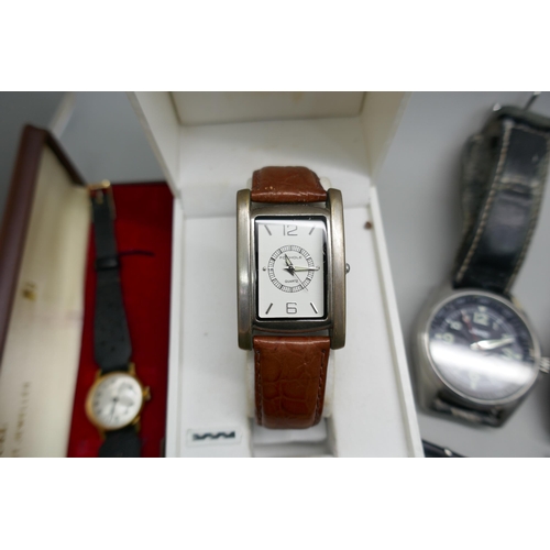 7185 - A collection of wristwatches including vintage