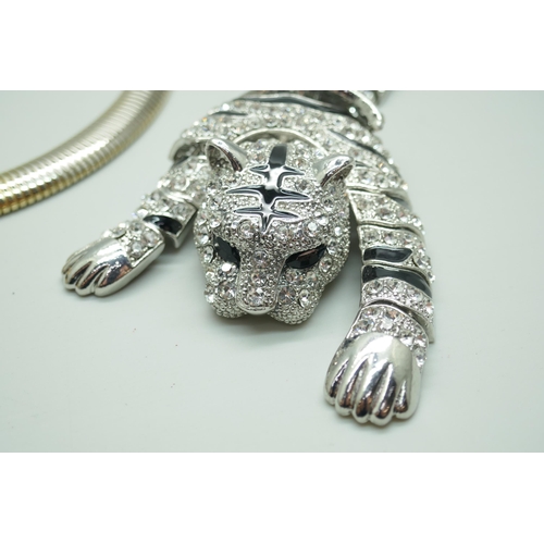 7236 - A statement tiger brooch signed BO, 26cm, and a leopard necklace