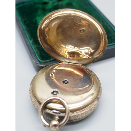 7239 - A 14k gold fob watch in fitted case