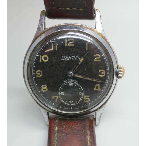 7242 - A 1940s Helma Wasserdicht military style wristwatch with black dial, 35mm including crown