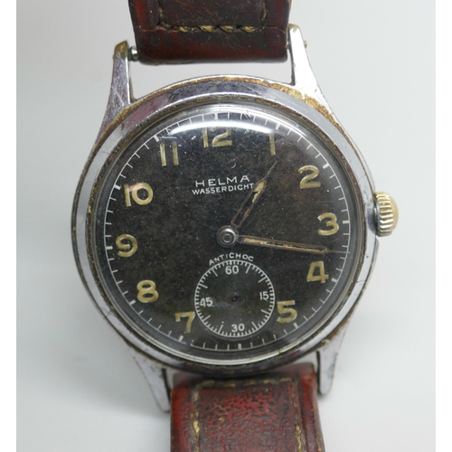 7242 - A 1940s Helma Wasserdicht military style wristwatch with black dial, 35mm including crown