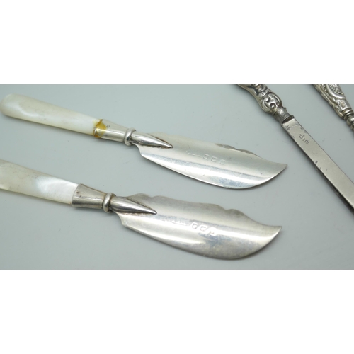 7251 - Two silver and mother of pearl preserve knives, one handle re-glued, and four silver handled items