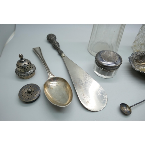 7257 - A collection of silver items including teaspoons, two dishes, sugar tongs, pots, etc., 196g of silve... 