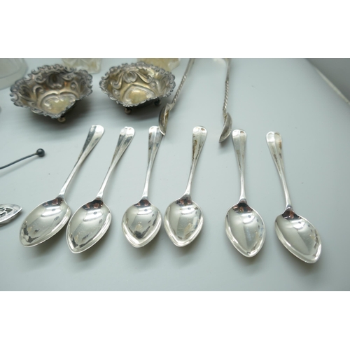 7257 - A collection of silver items including teaspoons, two dishes, sugar tongs, pots, etc., 196g of silve... 