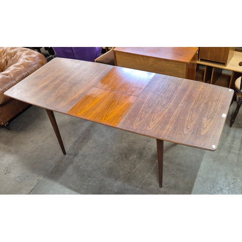 64A - A McIntosh teak extending T2 model dining table