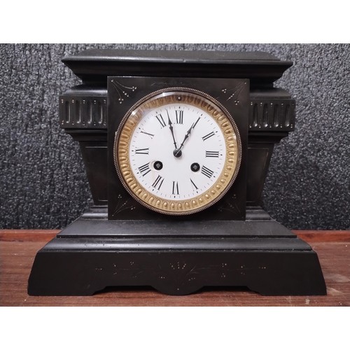 272 - A 19th Century French Belge noir mantel clock