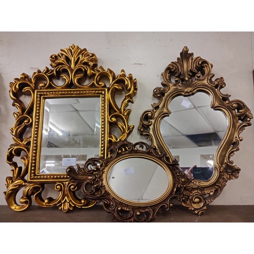 280 - Three Rococo style gilt framed mirrors