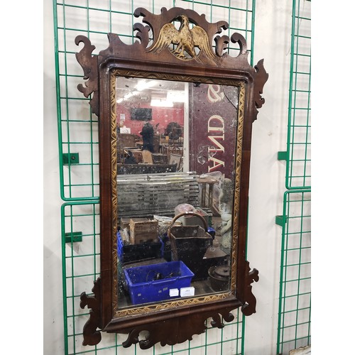 283 - A George II style walnut and parcel gilt framed mirror