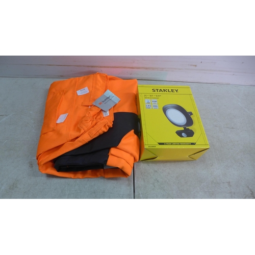 5316 - A pair of 3M high visibility trousers, size 42T and a Stanley 30W LED floodlight