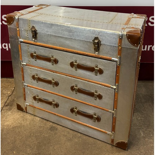 78K - An aviation style riveted chrome and brown leather chest