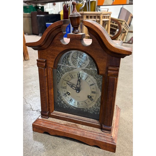 272A - A 19th Century style beech mantel clock