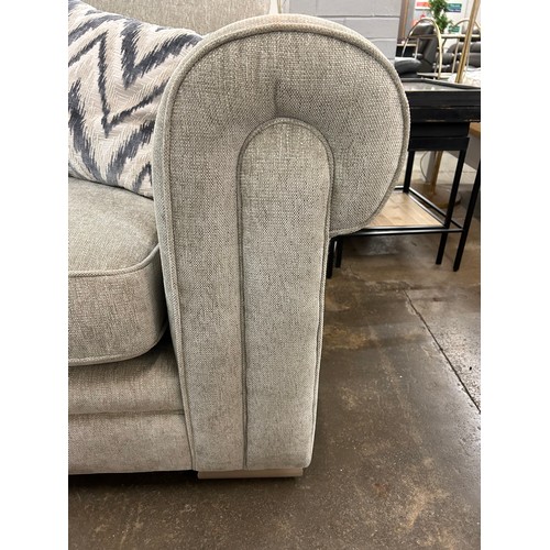 3102D - A beige upholstered three seater sofa and a love seat