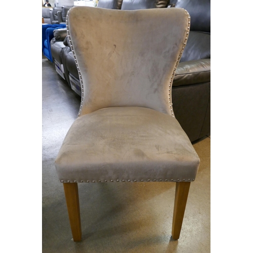 3089 - A set of 4 velvet upholstered dining chairs *This lot is subject to VAT