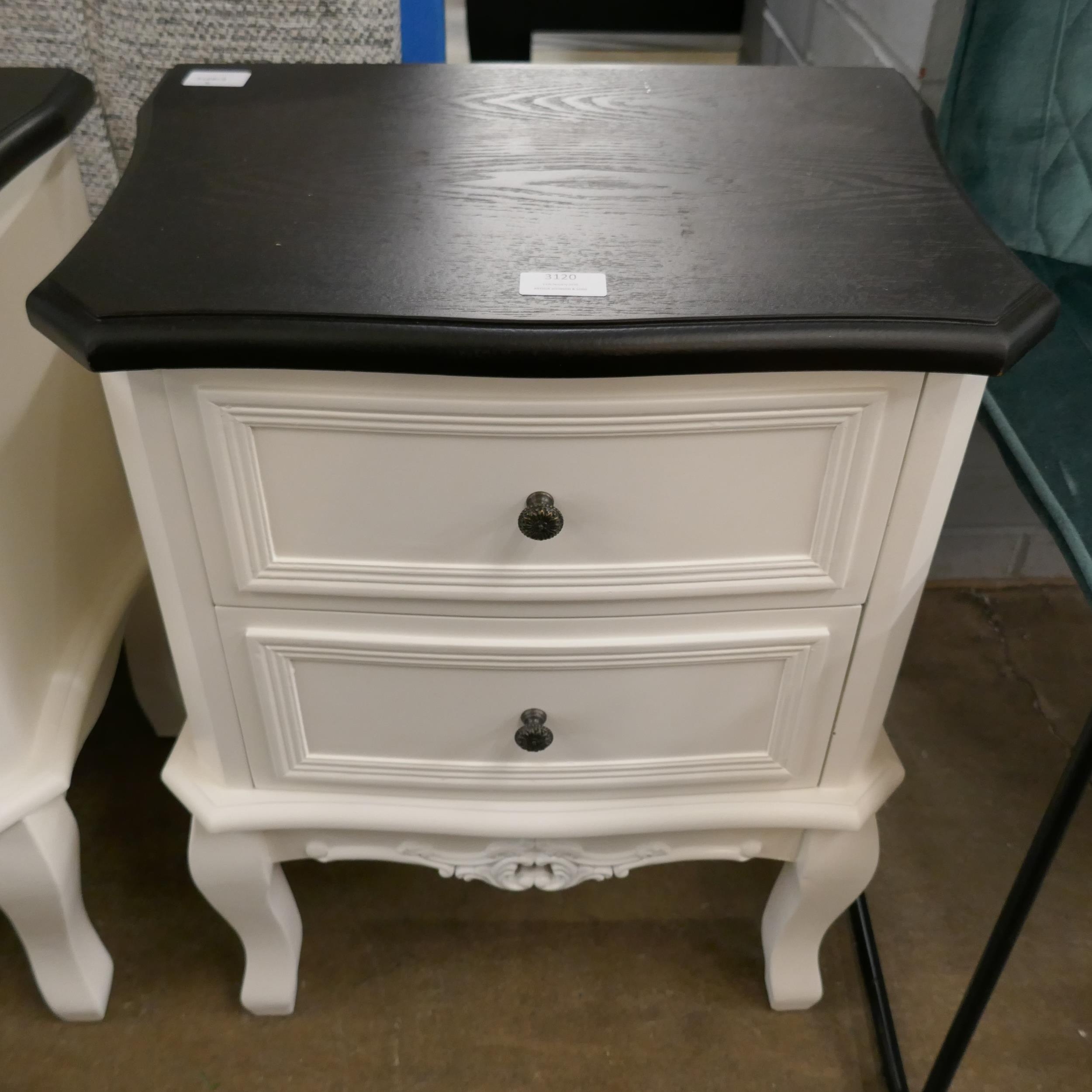 A white two drawer bedside with contrast top