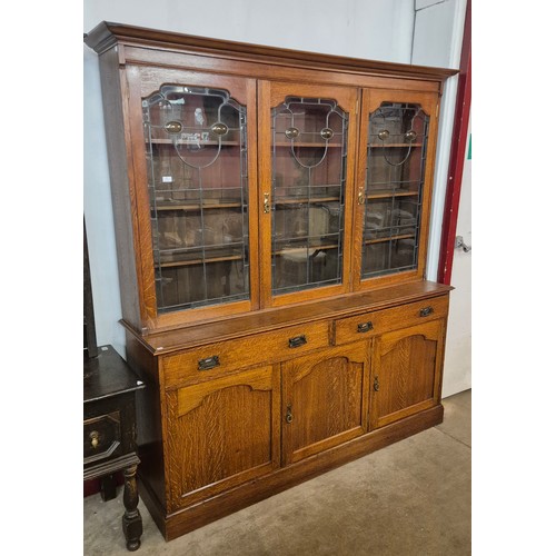 85 - An Arts & Crafts oak bookcase