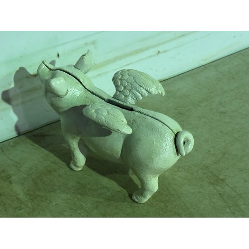 5090 - A cast metal flying pig piggy bank* This lot is subject to VAT