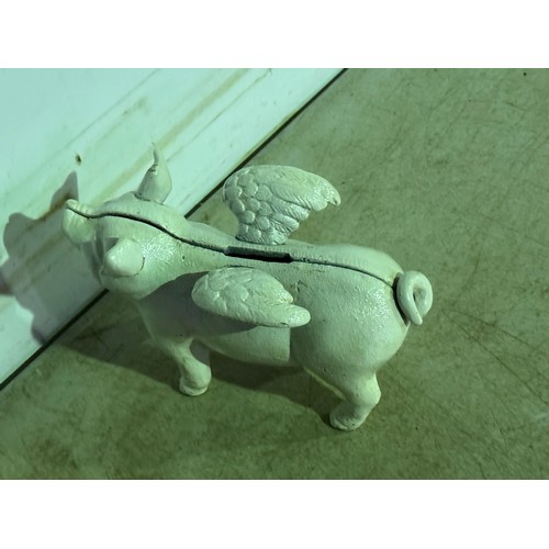 5090 - A cast metal flying pig piggy bank* This lot is subject to VAT