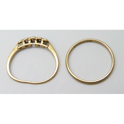 7003 - A yellow metal and diamond ring, 1.2g, and a 9ct gold wedding band, 0.6g, K