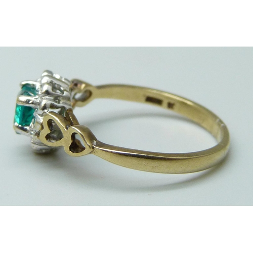 7008 - A 9ct gold, diamond and heart shaped green stone ring, 1.9g, M