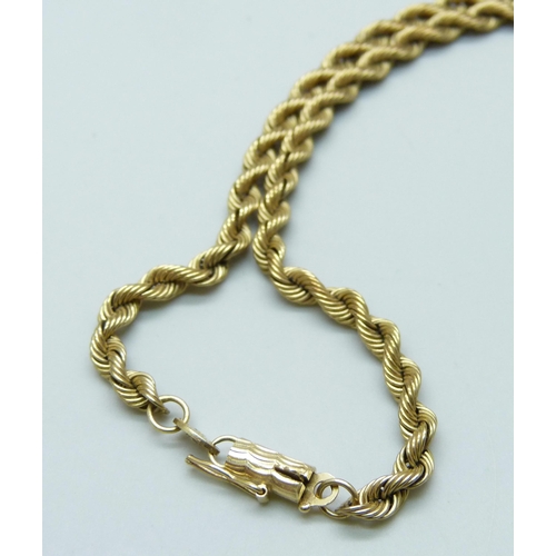 7015 - A 9ct gold rope twist chain, the end link set with a small diamond, 17.6g, 47.5cm