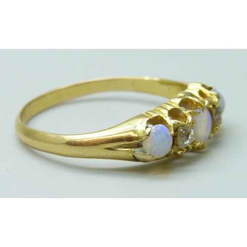 7016 - A Victorian yellow metal opal and diamond set ring, 2.9g, Q