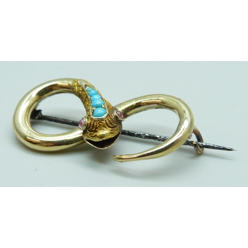 7017 - A late 19th Century yellow metal turquoise 
set brooch in the form of a snake, with memorial compart... 