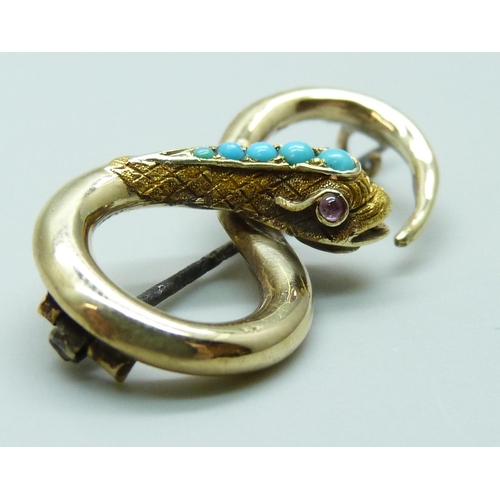 7017 - A late 19th Century yellow metal turquoise 
set brooch in the form of a snake, with memorial compart... 