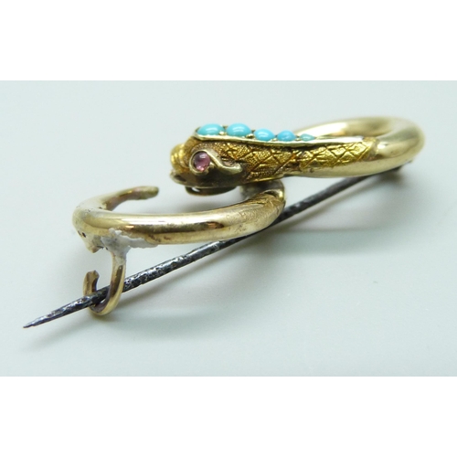 7017 - A late 19th Century yellow metal turquoise 
set brooch in the form of a snake, with memorial compart... 