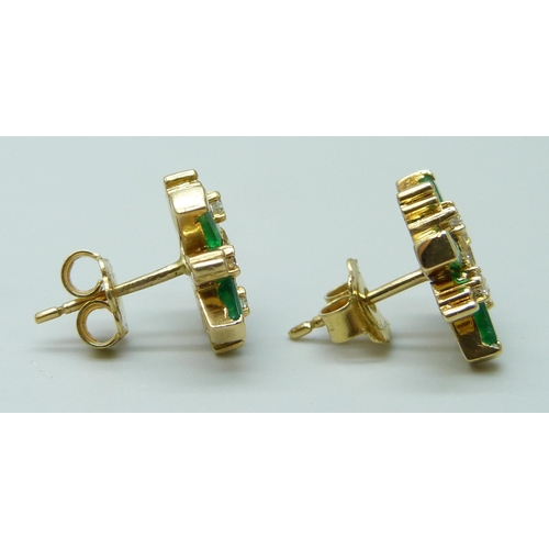 7045 - A pair of yellow metal, emerald and diamond earrings, the butterflies marked 750 for 18ct, 5.7g, 1.4... 