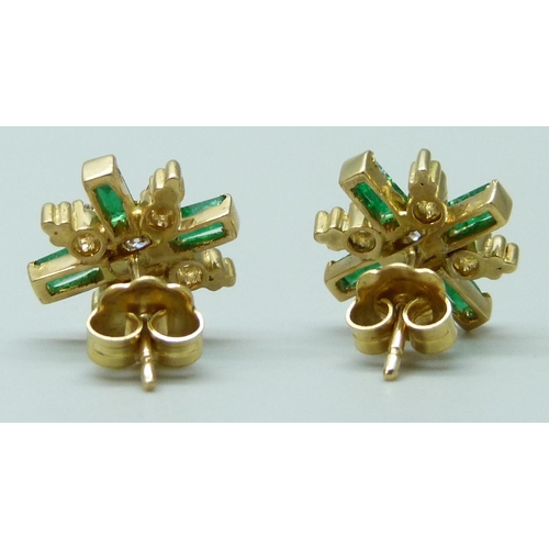 7045 - A pair of yellow metal, emerald and diamond earrings, the butterflies marked 750 for 18ct, 5.7g, 1.4... 