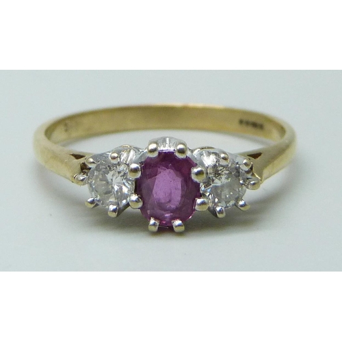 7063 - A 9ct gold, ruby and diamond ring, 1.8g, N