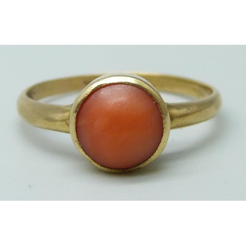 7066 - A yellow metal coral set ring, stamped 18ct, 2.5g, O