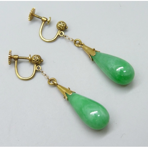 7080 - A pair of yellow metal mounted jade earrings, 3.8cm drop, 8g