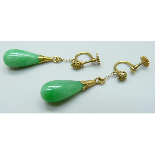 7080 - A pair of yellow metal mounted jade earrings, 3.8cm drop, 8g