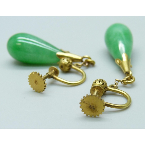 7080 - A pair of yellow metal mounted jade earrings, 3.8cm drop, 8g