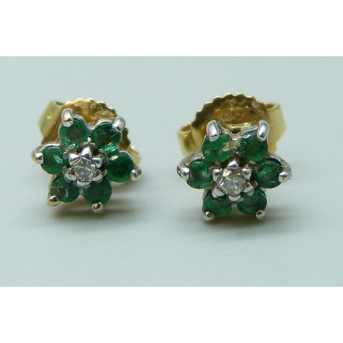 7083 - A pair of yellow metal, emerald and diamond cluster earrings, the butterflies marked 750 for 18ct, 1... 