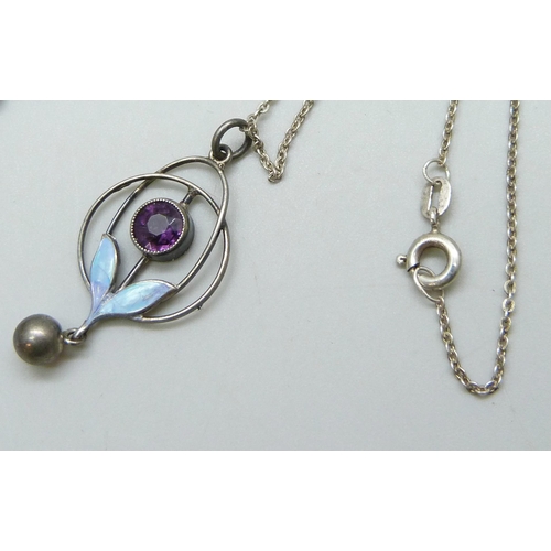 7087 - A white metal and enamel Art Nouveau pendant on a German sterling silver chain, 3.3cm drop, together... 