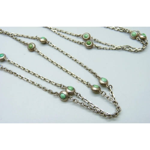 7093 - A white metal long guard chain set with turquoise, 43g, 173cm