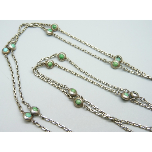 7093 - A white metal long guard chain set with turquoise, 43g, 173cm