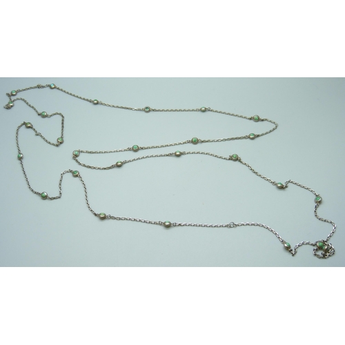 7093 - A white metal long guard chain set with turquoise, 43g, 173cm