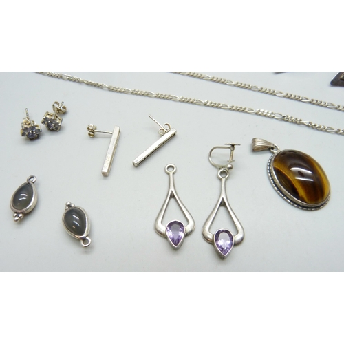 7104 - A silver figaro chain, three pairs of silver earrings, a pair of silver amethyst set earrings, one l... 