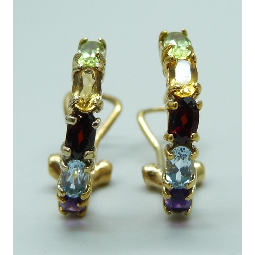 7108 - A pair of silver gilt multi gemstone set cuff style earrings, 4.3g