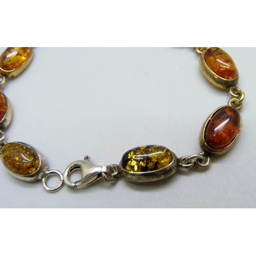 7110 - A silver gilt amber set bracelet, 9.6g, 18cm