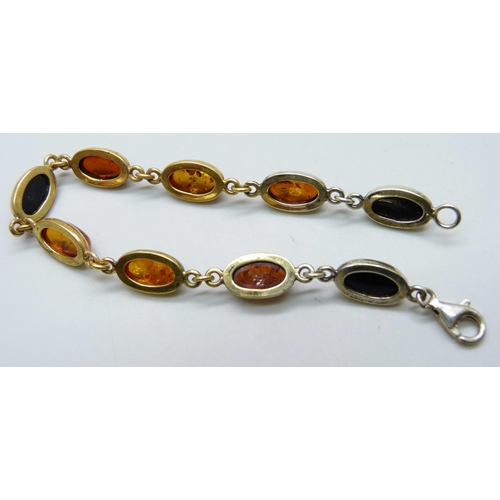 7110 - A silver gilt amber set bracelet, 9.6g, 18cm